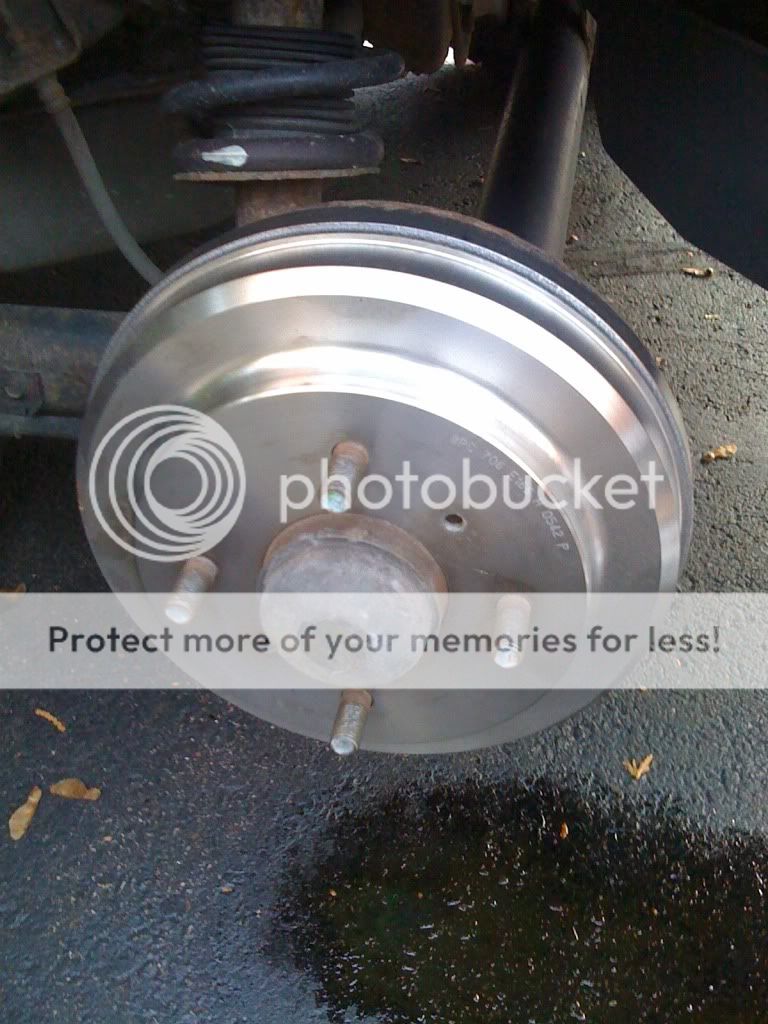 How to install new rear brake drums on 01 Nissan Sentra (w/ Photos