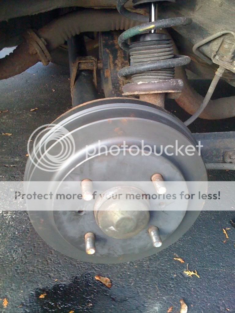 How to install new rear brake drums on 01 Nissan Sentra (w/ Photos