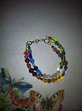 M104(2), 8" Glass beads, double strand bracelet with spring clastp.